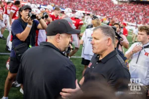 Nebraska Cornhusker head coach Matt Rhule and Rutgers Scarlet Knight head coach shake hands at center fileld during a college football game Saturday, October 5, 2024, in Lincoln, Nebraska. Photo by John S. Peterson.