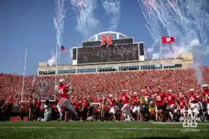 Nebraska Cornhusker quarterback Dylan Raiola (15) lead out Ndamukong Suh (93) and the rest of the Husker before taking on Rutgers Scarlet Knights during a college football game Saturday, October 5, 2024, in Lincoln, Nebraska. Photo by John S. Peterson.