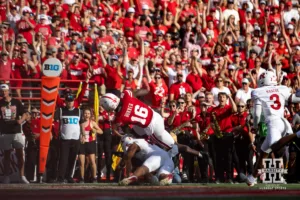 Nebraska Cornhusker wide receiver Janiran Bonner (16) scores a touchdown against Rutgers Scarlet Knight defensive back Shaquan Loyal (6) in the during a college football game Saturday, October 5, 2024, in Lincoln, Nebraska. Photo by John S. Peterson.