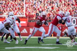 Nebraska Cornhusker running back Rahmir Johnson (14) runs with the ball against the Rutgers Scarlet Knights during a college football game Saturday, October 5, 2024, in Lincoln, Nebraska. Photo by John S. Peterson.