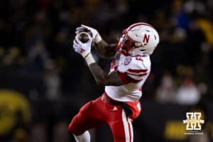 Nebraska Cornhuskers running back Emmett Johnson (21) makes a catch against the Iowa Hawkeyes during a college football game Friday, November 29, 2024, in Iowa City, Iowa. Photo by John S. Peterson.