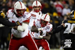 Nebraska Cornhuskers running back Emmett Johnson (21) runs with the ball against the Iowa Hawkeyes during a college football game Friday, November 29, 2024, in Iowa City, Iowa. Photo by John S. Peterson.