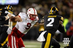Nebraska Cornhuskers defensive lineman Ty Robinson (9) out to tackle Iowa Hawkeyes running back Kaleb Johnson (2) during a college football game Friday, November 29, 2024, in Iowa City, Iowa. Photo by John S. Peterson.