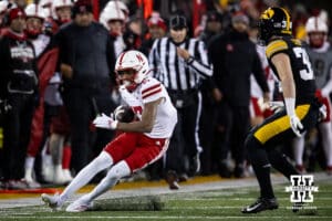 Nebraska Cornhuskers wide receiver Jacory Barney Jr. (17) runs with the ball against Iowa Hawkeyes defensive back Quinn Schulte (30) in the second quarter during a college football game Friday, November 29, 2024, in Iowa City, Iowa. Photo by John S. Peterson.