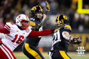 Nebraska Cornhuskers defensive lineman Elijah Jeudy (16) reaches out to tackle during a college football game Friday, November 29, 2024, in Iowa City, Iowa. Photo by John S. Peterson.