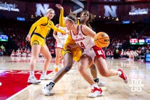 Nebraska Cornhuskers guard Callin Hake (14) drives the baseline against UMKC Roos guard Elauni Bennett (2) in the second quarter during a college women’s basketball game Tuesday, November 26, 2024, in Lincoln, Nebraska. Photo by John S. Peterson.