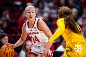 Nebraska Cornhuskers guard Callin Hake (14) dribbles the ball against UMKC Roos forward Funmi Amode (10) in the first half during a college women’s basketball game Tuesday, November 26, 2024, in Lincoln, Nebraska. Photo by John S. Peterson.