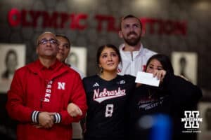 Nebraska Cornhusker Lexi Rodriguez (8) and parents watching a video of Lexi on Senior Night after a college volleyball match against the Wisconsin Badgers Saturday, November 23, 2024 in Lincoln, Nebraska. Photo by John S. Peterson.