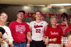Nebraska Cornhusker Lindsay Krause (22) and parents watching a video of Lindsay for Senior Night after a college volleyball match against the Wisconsin Badgers Saturday, November 23, 2024 in Lincoln, Nebraska. Photo by John S. Peterson.