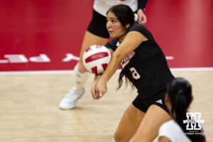 Nebraska Cornhusker libero Lexi Rodriguez (8) digs the ball against the Wisconsin Badgers in the third set during a college volleyball match Saturday, November 23, 2024 in Lincoln, Nebraska. Photo by John S. Peterson.