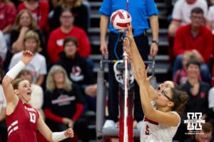 Nebraska Cornhusker middle blocker Rebekah Allick (5) blocks a spike from Wisconsin Badger outside hitter Sarah Franklin (13) in the third set during a college volleyball match Saturday, November 23, 2024 in Lincoln, Nebraska. Photo by John S. Peterson.
