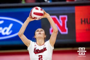 Nebraska Cornhusker setter Bergen Reilly (2) the ball in the second set against the Wisconsin Badgers during a college volleyball match Saturday, November 23, 2024 in Lincoln, Nebraska. Photo by John S. Peterson.