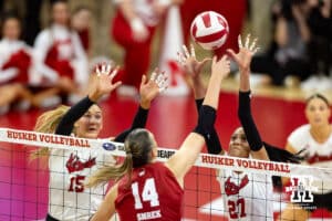 Nebraska Cornhusker outside hitter Harper Murray (27) tries to block Wisconsin Badger opposite Anna Smrek (14) in the first set during a college volleyball match Saturday, November 23, 2024 in Lincoln, Nebraska. Photo by John S. Peterson.