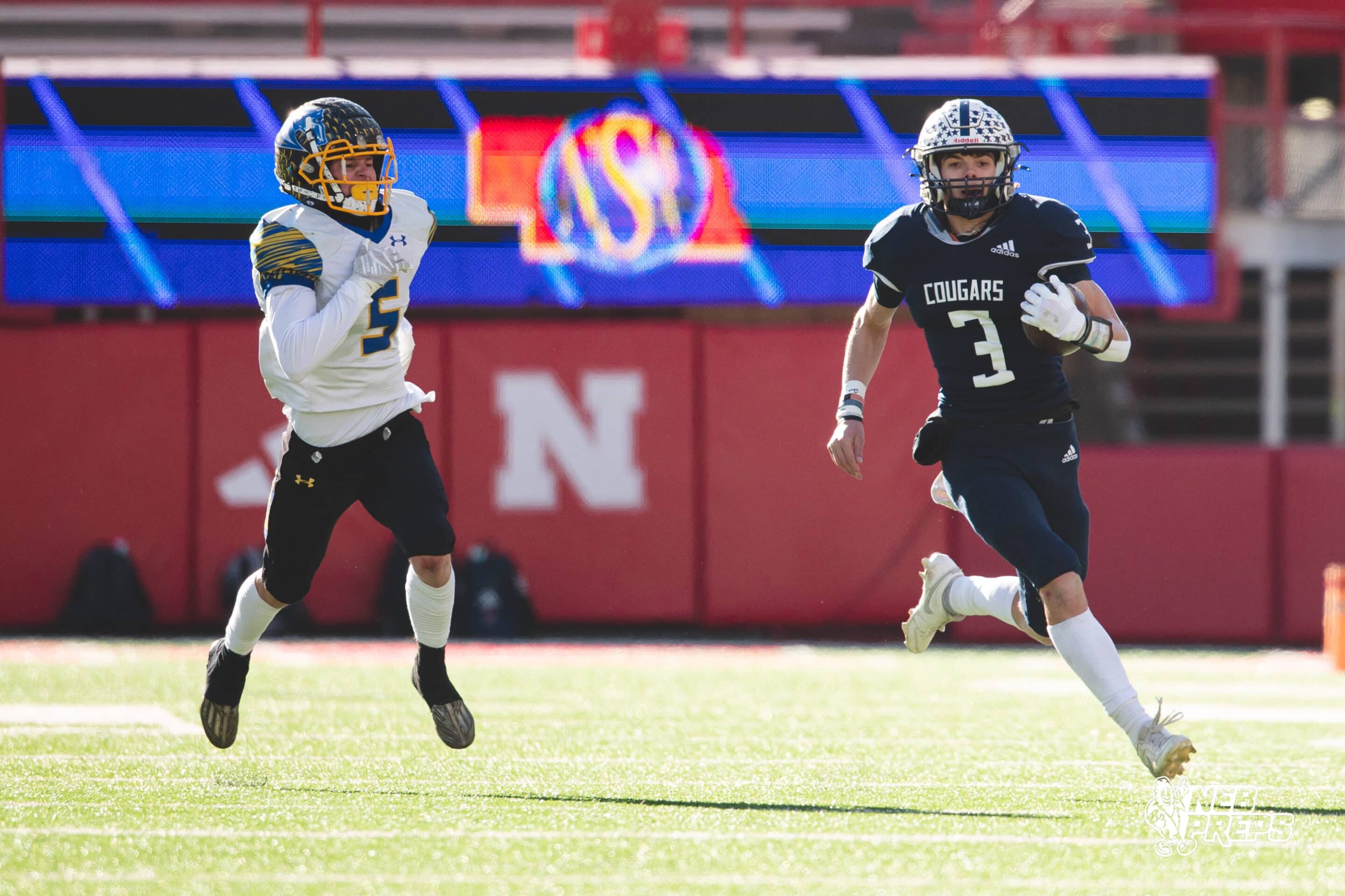 Central Valley quarterback Zaden Wolf rips off a long touchdown run against Riverside in the 2024 NSAA Football Class D2 State Championship. Photo by Mac Johnson.