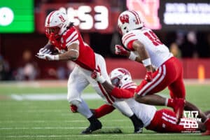 Nebraska Cornhusker running back Dante Dowdell (23) runs with the ball againt the Wisconsin Badgers in the third quarter during a college football game Saturday, November 23, 2024 in Lincoln, Nebraska. Photo by John S. Peterson.
