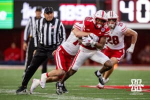 Nebraska Cornhusker wide receiver Jacory Barney Jr. (17) runs with the ball against Wisconsin Badger safety Preston Zachman (14) during a college football game Saturday, November 23, 2024 in Lincoln, Nebraska. Photo by John S. Peterson.