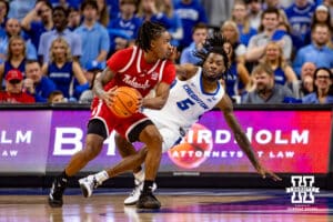 Nebraska Cornhusker guard Ahron Ulis (2) dribbles the ball against Creighton Bluejay guard Jamiya Neal (5) in the second half during a college basketball game Friday, November 22, 2024 in Omaha, Nebraska. Photo by John S. Peterson.