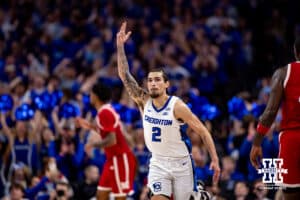 Creighton Bluejay guard Pop Isaacs (2) celebrates a three point shot against the Nebraska Cornhuskers in the first half during a college basketball game Friday, November 22, 2024 in Omaha, Nebraska. Photo by John S. Peterson.
