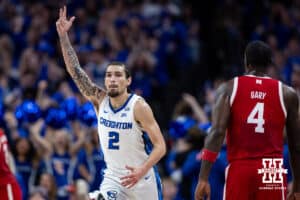 Creighton Bluejay guard Pop Isaacs (2) celebrates making a three point shot against the Nebraska Cornhuskers in the first half during a college basketball game Friday, November 22, 2024 in Omaha, Nebraska. Photo by John S. Peterson.