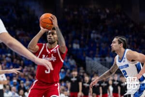 Nebraska Cornhusker guard Brice Williams (3) takes a shot against Creighton Bluejay center Ryan Kalkbrenner (11) in the first half during a college basketball game Friday, November 22, 2024 in Omaha, Nebraska. Photo by John S. Peterson.
