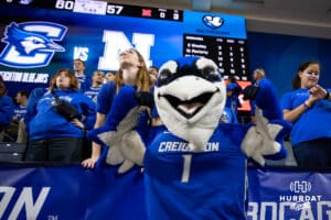Creighton Bluejays mascot Billy flexes for the camera during a women’s college basketball game against the Nebraska Cornhuskers Friday, November 22, 2024 in Omaha, Nebraska. Photo by John S. Peterson.