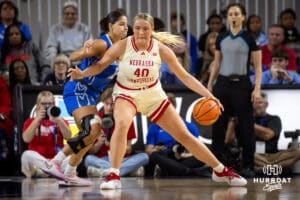 Nebraska Cornhusker center Alexis Markowski (40) drives to the basket against Creighton Bluejay guard Jayme Horan (12) during a women’s college basketball game Friday, November 22, 2024 in Omaha, Nebraska. Photo by John S. Peterson.