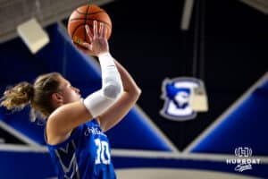 Creighton Bluejay guard Morgan Maly (30) makes a layup against the Nebraska Cornhuskers in the first half during a women’s college basketball game Friday, November 22, 2024 in Omaha, Nebraska. Photo by John S. Peterson.