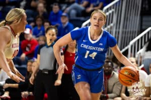 Nebraska Cornhusker guard Callin Hake (14) dribbles the ball against Nebraska Cornhusker center Alexis Markowski (40) in the first half during a women’s college basketball game Friday, November 22, 2024 in Omaha, Nebraska. Photo by John S. Peterson.