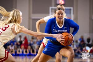 Creighton Bluejay guard Molly Mogensen (21) drives to the basket against the Nebraska Cornhuskers in the first half during a women’s college basketball game Friday, November 22, 2024 in Omaha, Nebraska. Photo by John S. Peterson.