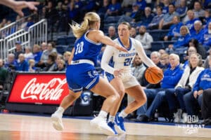 Creighton Bluejay guard Molly Mogensen (21) dribbles the ball during a women's college basketball game against the Drake Bulldogs Monday, November 11, 2024 in Omaha, Nebraska. Photo by Jaelle Johnson.