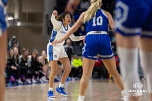 Creighton Bluejay guard Kiani Lockett (11) dribbles the ball during a women's college basketball game against the Drake Bulldogs Monday, November 11, 2024 in Omaha, Nebraska. Photo by Jaelle Johnson.