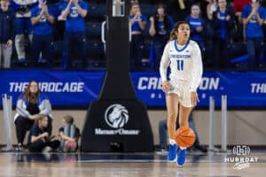 Creighton Bluejay guard Kiani Lockett (11) dribbles the ball during a women's college basketball game against the Drake Bulldogs Monday, November 11, 2024 in Omaha, Nebraska. Photo by Jaelle Johnson.