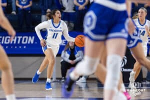 Creighton Bluejay guard Kiani Lockett (11) dribbles the ball during a women's college basketball game against the Drake Bulldogs Monday, November 11, 2024 in Omaha, Nebraska. Photo by Jaelle Johnson.