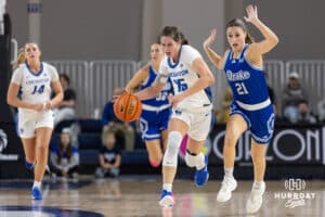 Creighton Bluejay guard Lauren Jensen (15) dribbles the ball during a women's college basketball game against the Drake Bulldogs Monday, November 11, 2024 in Omaha, Nebraska. Photo by Jaelle Johnson.