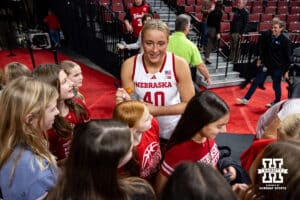 Nebraska Cornhusker center Alexis Markowski (40) signs autographs after the win over North Alabama Lions during a college women’s basektball game Tuesday, November 19, 2024 in Lincoln, Nebraska. Photo by John S. Peterson.