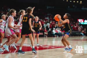 A Nebraska Lasers player shoots the ball during the halftime game on Tuesday, November 19, 2024, in Lincoln, Nebraska. Photo by Charlotte A. Gottfried.
