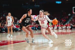 Kendal Moriarty (15) plays offense, while Jazzy Klinge (20) plays defense during a college basketball game Tuesday, November 19, 2024, in Lincoln, Nebraska. Photo by Charlotte A. Gottfried.