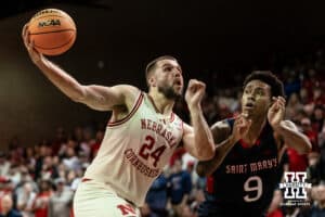 Nebraska Cornhusker guard Rollie Worster (24)dirve to the basket St. Mary's Gaels forward Ashton Hardaway (9) during a college basketball game Sunday, November 17, 2024 in Sioux Falls, South Dakota.