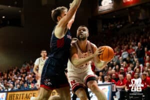 (24)goes for a layup against St. Mary's Gaels guard Augustas Marciulionis (3) during a college basketball game Sunday, November 17, 2024 in Sioux Falls, South Dakota.