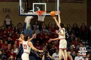Nebraska Cornhusker guard Gavin Griffiths (12) puts up at layup against St. Mary's Gaels guard Augustas Marciulionis (3) during a college basketball game Sunday, November 17, 2024 in Sioux Falls, South Dakota.