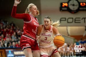 Nebraska Cornhusker guard Allison Weidner (3) drives to the basket against South Dakota Coyote guard Addison Klosterbuer (11) during a college women's basketball game Saturday, November 16, 2024 in Sioux Falls, South Dakota. Photo by Collin Stilen.