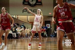 Nebraska Cornhusker guard Britt Prince (23) shots a three-point shot against the South Dakota Coyotes during a college women's basketball game Saturday, November 16, 2024 in Sioux Falls, South Dakota. Photo by Collin Stilen.