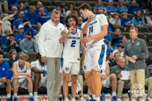 Creighton Bluejays Pop Isaac (2) and Ryan Kalkbrenner (11) talk at a break in the action against UMKC during a college basketball game Saturday, November 16th, 2024 in Omaha Nebraska. Photo by Brandon Tiedemann.