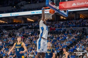 Creighton Bluejay Fredrick King (33) dunk the basketball against UMKC during a college basketball game Saturday, November 16th, 2024 in Omaha Nebraska Photo by Brandon Tiedemann