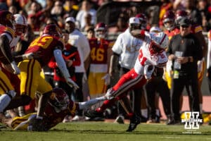 Nebraska Cornhusker running back Emmett Johnson (21) spins for a few more yards against the USC Trojans in the second quarter during a college football game Saturday, November 16, 2024 in Los Angeles, California. Photo by John S. Peterson.