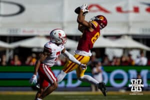 USC Trojan wide receiver Collin Fasse (89) makes a catch against Nebraska Cornhusker defensive back Malcolm Hartzog Jr. (7) in the first quarter during a college football game Saturday, November 16, 2024 in Los Angeles, California. Photo by John S. Peterson.