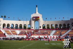Nebraska Cornhuskers cheer squad run the Nebraska flags in the endzone after a touchdown against the USC Trojans in the first quarter during a college football game Saturday, November 16, 2024 in Los Angeles, California. Photo by John S. Peterson.