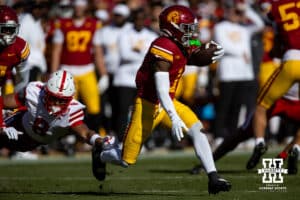Nebraska Cornhusker defensive back DeShon Singleton (8) reaches out to tackle USC Trojan wide receiver Zachariah Branch (1) in the first quarter during a college football game Saturday, November 16, 2024 in Los Angeles, California. Photo by John S. Peterson.