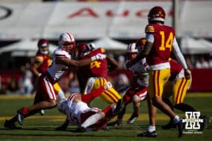 Nebraska Cornhusker linebacker Javin Wright (33) linebacker John Bullock (5) tackle USC Trojan running back Woody Marks (4) in the first quarter during a college football game Saturday, November 16, 2024 in Los Angeles, California. Photo by John S. Peterson.