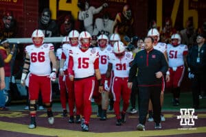 Nebraska Cornhusker quarterback Dylan Raiola (15) leads some Huskers out to warm up before a college football game against the USC Trojans Saturday, November 16, 2024 in Los Angeles, California. Photo by John S. Peterson.